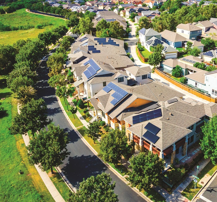 A community in Austin, Texas features solar panels on many of its buildings.