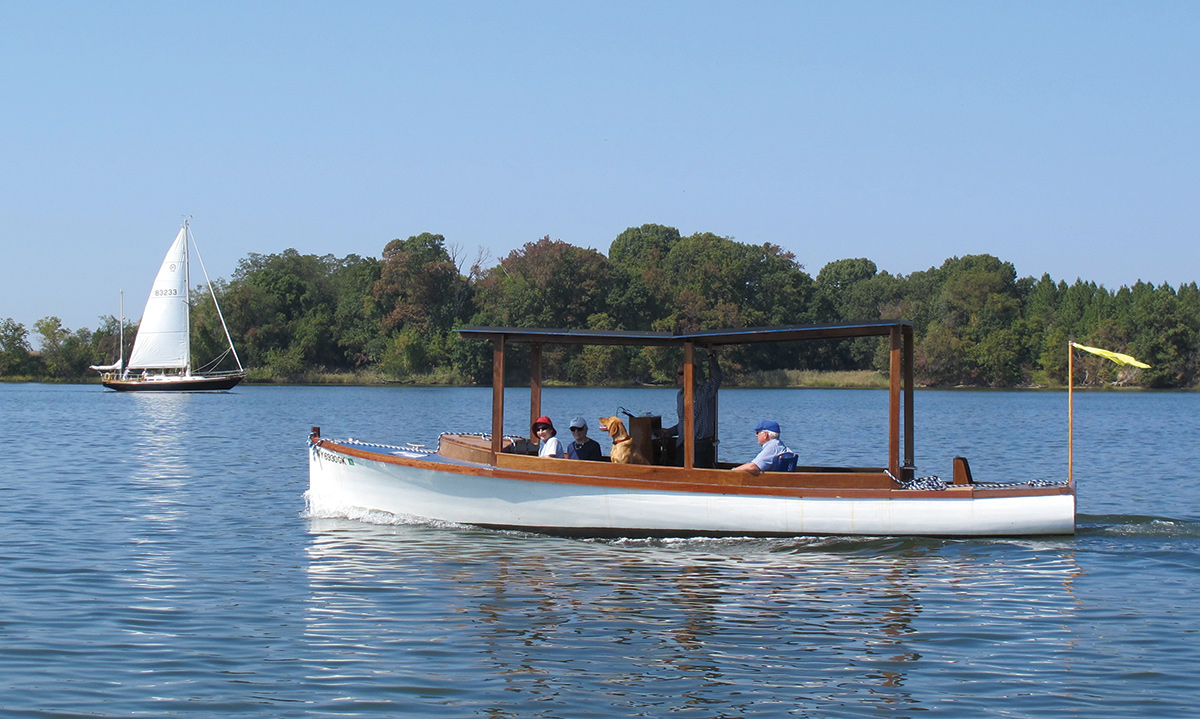 An outing on Sol, the first wooden boat.
