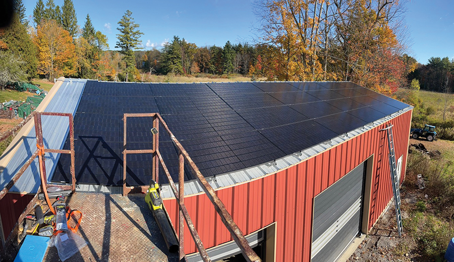 Dan Fontaine’s rooftop solar array installed on a metal-roof outbuilding. Many guided DIY customers use solar not only for the main home, but also for shops, barns, garages, and other property infrastructure.